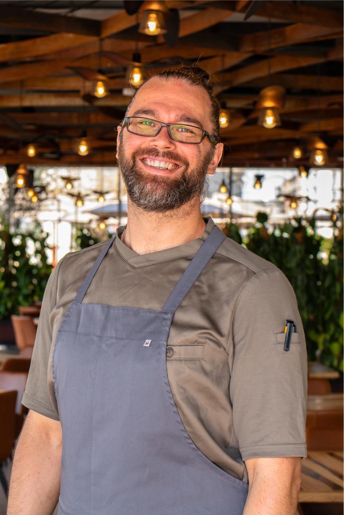a man wearing a apron