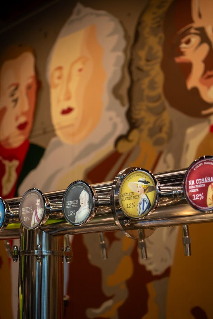 a row of beer taps