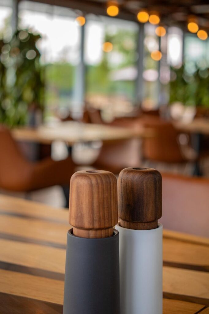 a salt and pepper shakers on a table